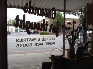 The front window of Grounds for Thought, looking out onto Wooster St.